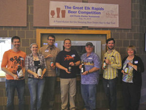 The home brewers at the Great Elk Rapids Beer Competition with celebrity judge Matt Drake of Short's Brewing Co. in the center.