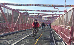Cyclists crossing the Williamsburg Bridge to Brooklyn.