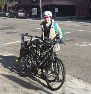 Jessica DuFresne stopping to eat in the middle of her Manhattan bike ride.