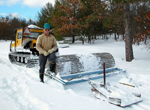 Lyle Kline of the Loud Creek Nordic Ski Club and the club's 25-year-old groomer.